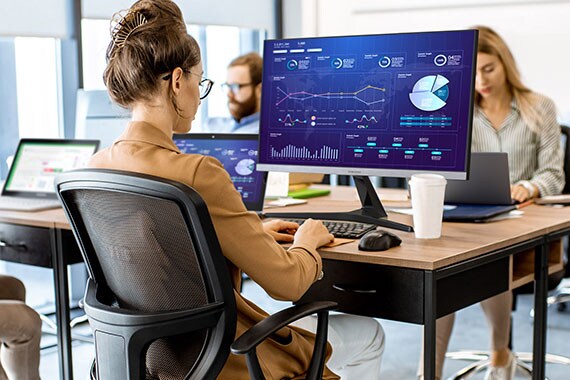 woman using a samsung commercial monitor in an office